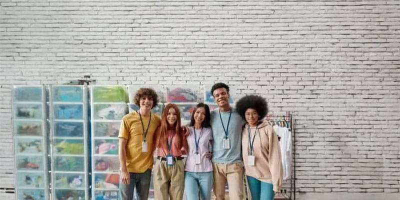 Five volunteers standing together