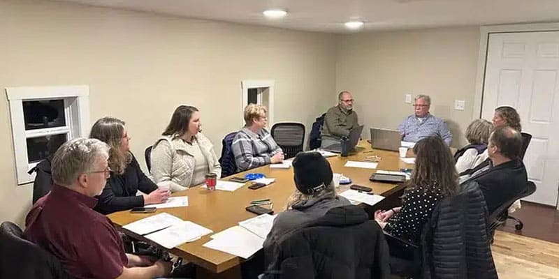 Goodhue County Habitat Leadership[ around a table