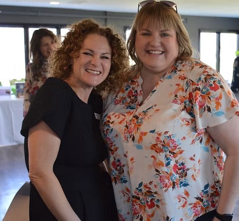 Two women smiling at the Spring Has Sprung Habitat Fundraiser