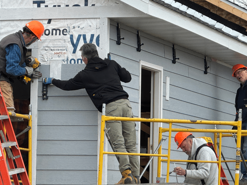 Group of volunteers working on a Habitat build.