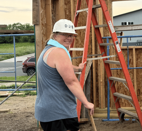 Habitat homeowner on build site.