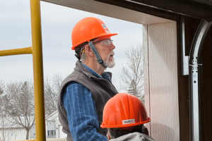 Lou Behrens, a Habitat for Humanity volunteer at the build site.