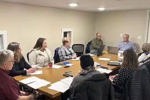 Goodhue County Habitat Leadership[ around a table
