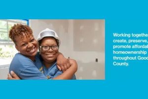 Working together to create, preserve and promote affordable housing throughout Goodhue County - with a mom and child hugging on the worksite