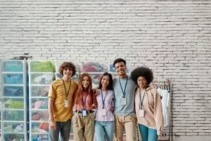 Five volunteers standing together