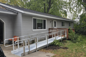 Metal ramp leading into a house.